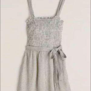Strapped Smocked Romper. NWT